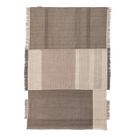 Textured fabric in shades of taupe, beige, and cream with horizontal and vertical block patterns and fringe detailing.
