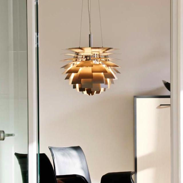 Golden pendant lamp with layered, petal-like design, offering a modern aesthetic for stylish interiors.
