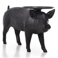 Black ceramic pig-shaped stool with glossy finish, featuring a round tray on its back. Perfect for rustic decor.