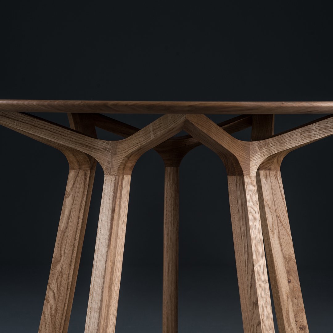 Natural wood finish with smooth, geometric patterns and warm tones; modern design ideal for contemporary spaces.