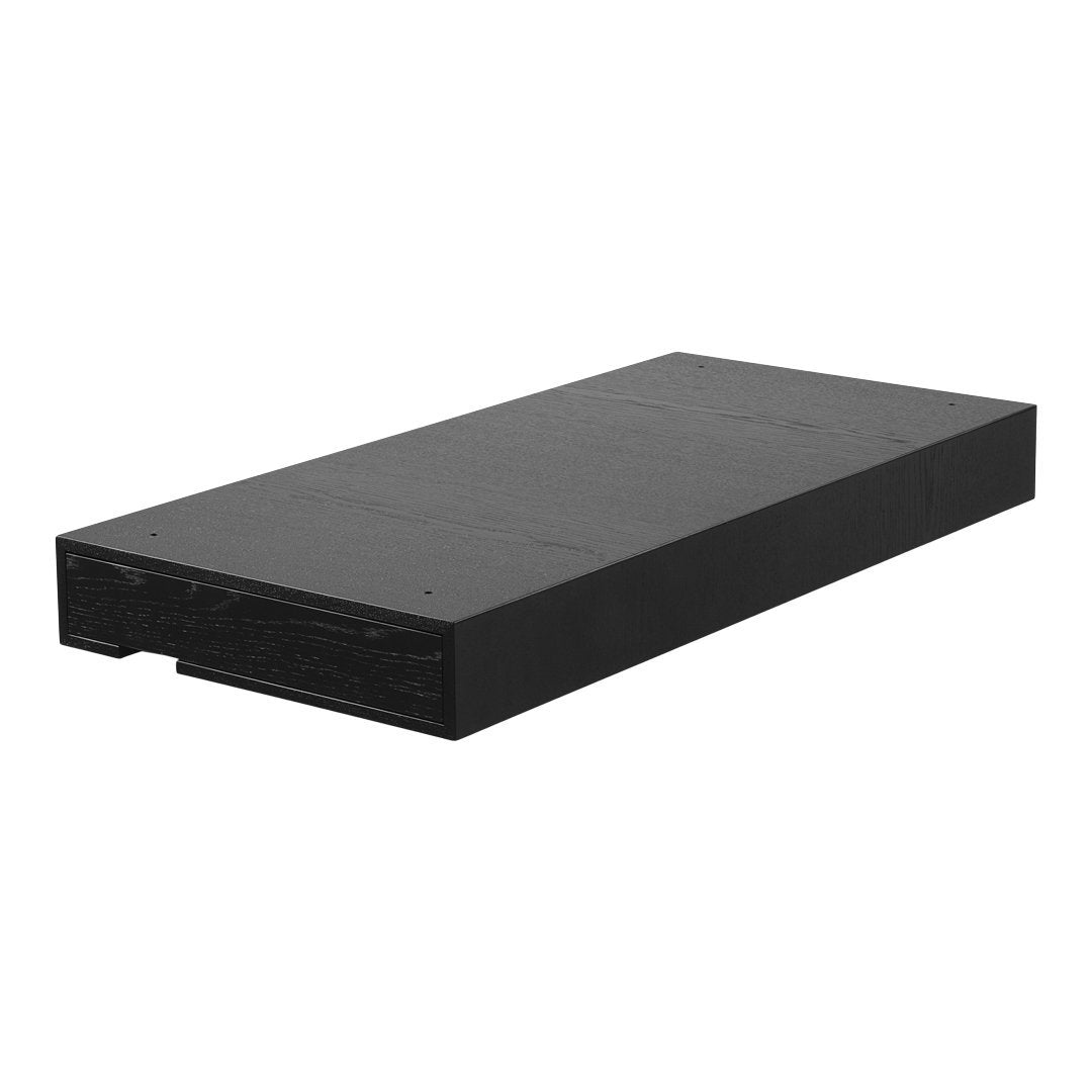 Solid black rectangular battery pack with a sleek, matte finish and minimalist design.