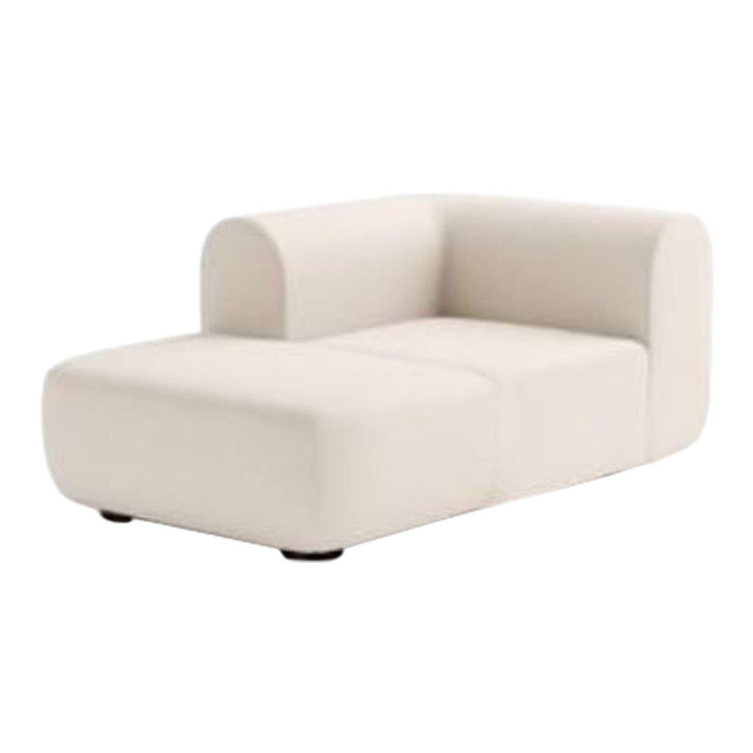 Contemporary cream-colored sectional sofa with smooth, clean lines and a minimalist design. Perfect for modern decor.