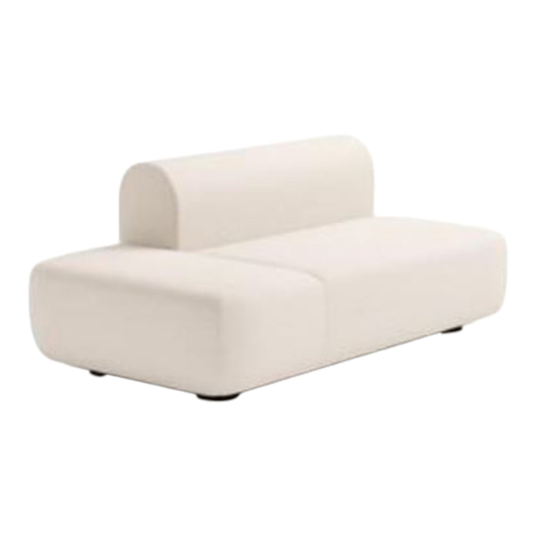 Modern white sofa with a minimalist, smooth design and rounded backrest, perfect for contemporary decor.
