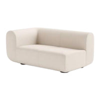 Cream-colored, minimalist sofa with smooth, solid fabric and rounded edges, perfect for modern decor.