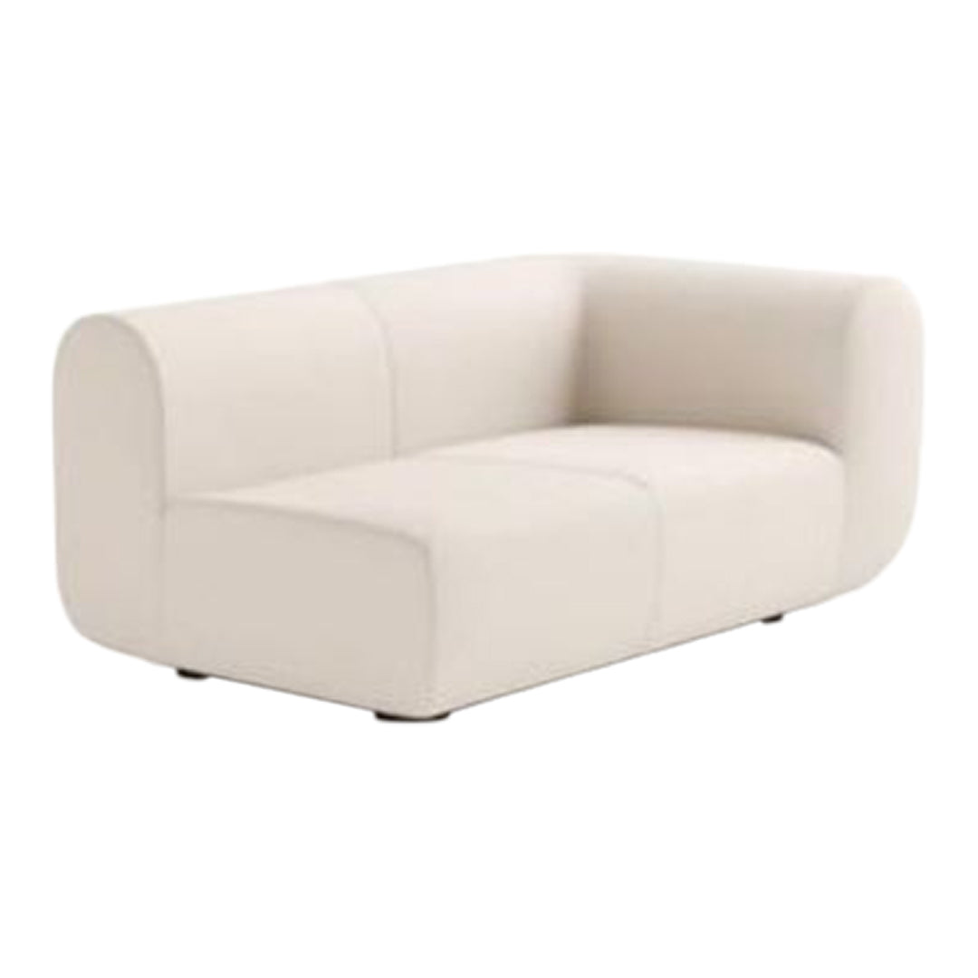 Stylish white modular sofa with smooth, minimalist design and subtle quilted texture. Perfect for modern interiors.