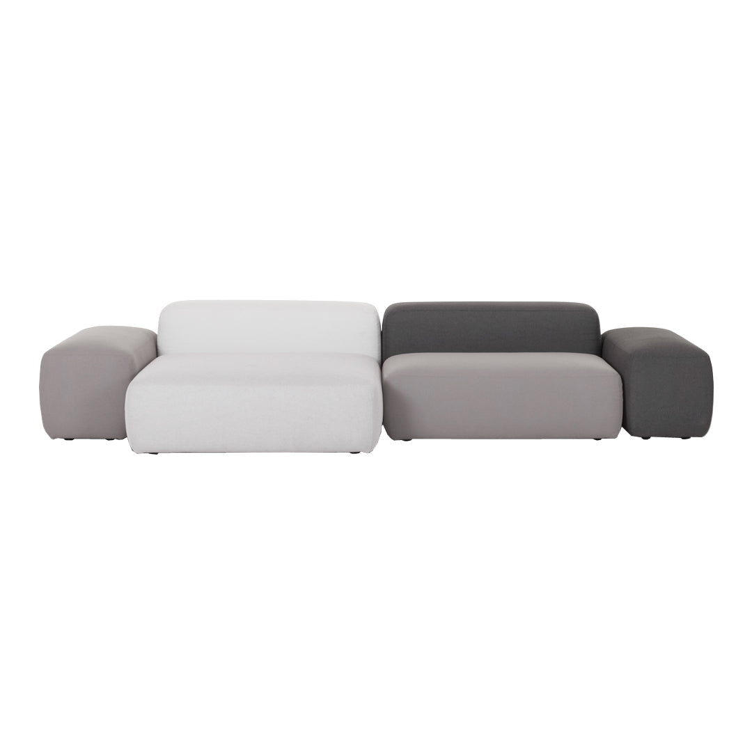Modern modular sofa in a sleek color palette of white, light gray, and dark gray with smooth, rounded edges.