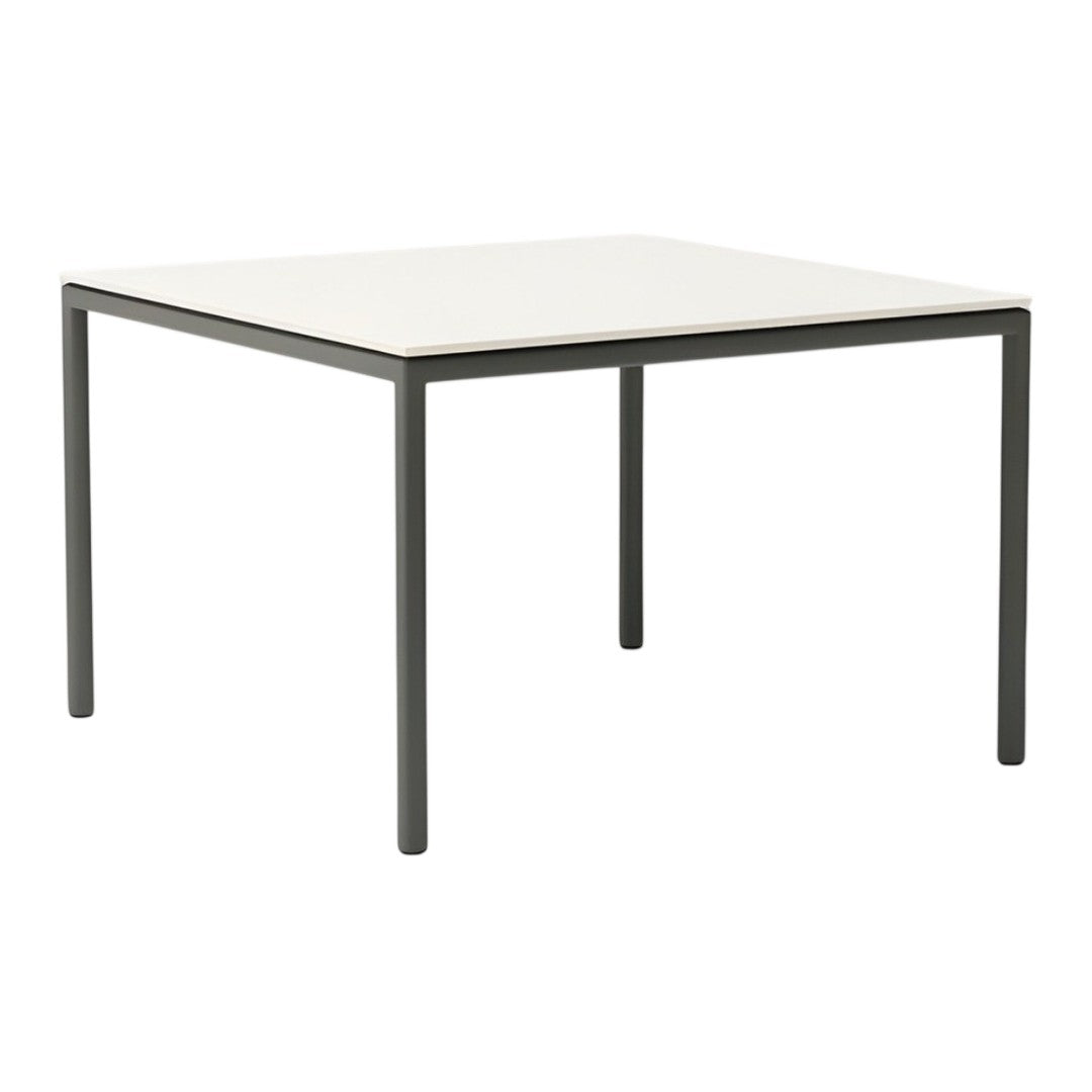 Square dining table with a sleek white top and minimalist black metal legs, perfect for modern decor.