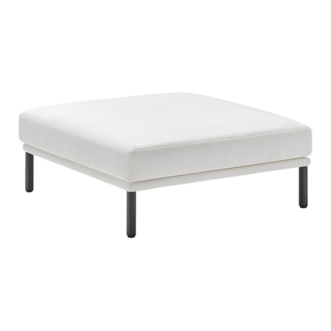 White square ottoman with a smooth, minimalist design and sleek black legs. Perfect for modern decor.