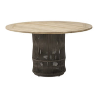 Round dining table with a light wooden top and dark, ribbed base. Modern design with natural and neutral tones.