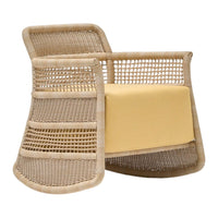 Woven beige chair with a smooth yellow cushion and open geometric pattern for modern decor.