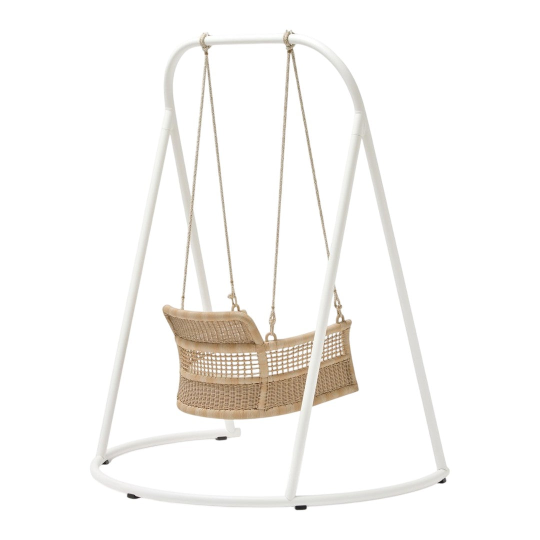 Cream wicker swing chair with a white metal frame, featuring a minimalist design and natural tones.