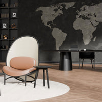 Modern chair with a beige and brown pattern, set against a sleek black backdrop with a world map.