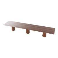 Long wooden bench with a rich walnut finish and three unique, cylindrical bases. Modern minimalist design.