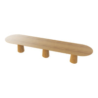 Natural wood coffee table with an oval top and three rounded legs, featuring a warm, light brown finish.