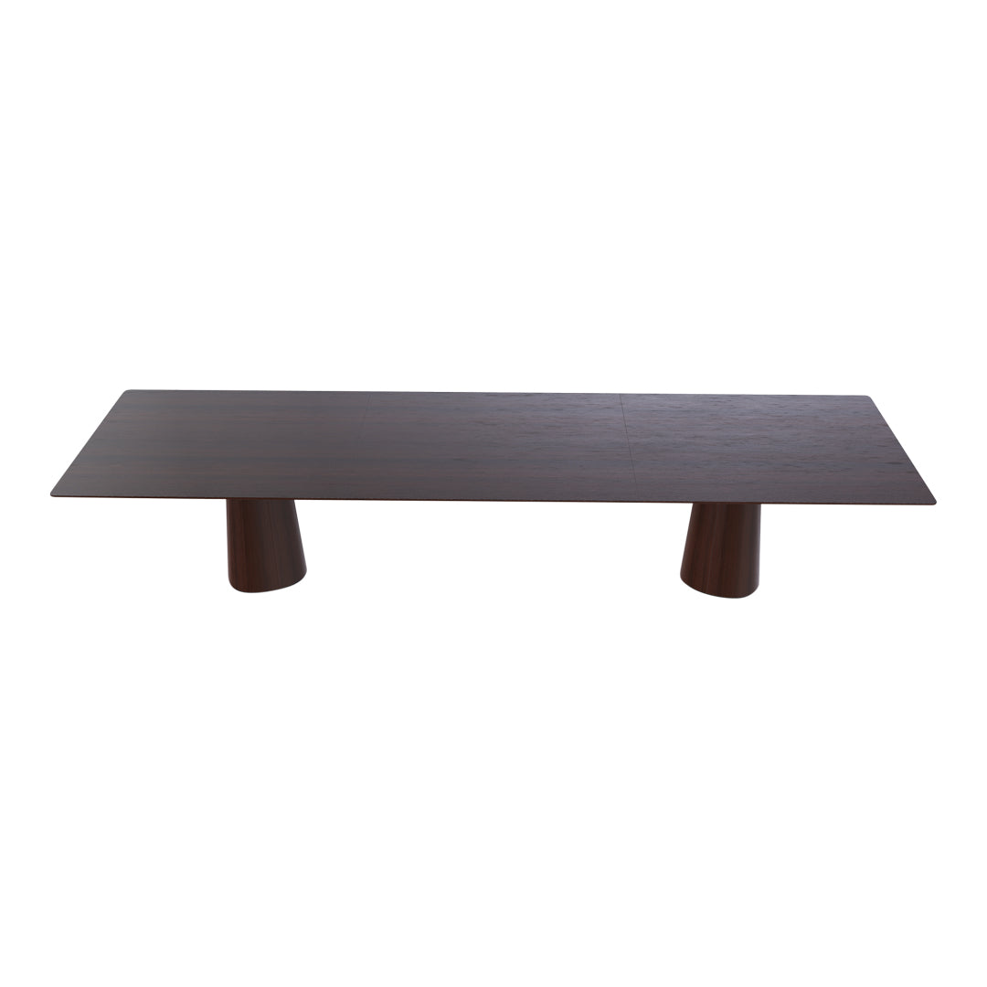 Dark wood coffee table with a smooth, rectangular top and uniquely shaped light wood legs.