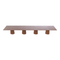 Long wooden table with a smooth, natural finish and four textured cylindrical legs in a warm wooden tone.