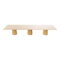 Light wood coffee table with a sleek, minimalist design and three round pedestal legs. Simple, natural color palette.