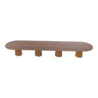 Long, oval wooden table with a dark walnut finish and light wood legs, showcasing a sleek, modern design.