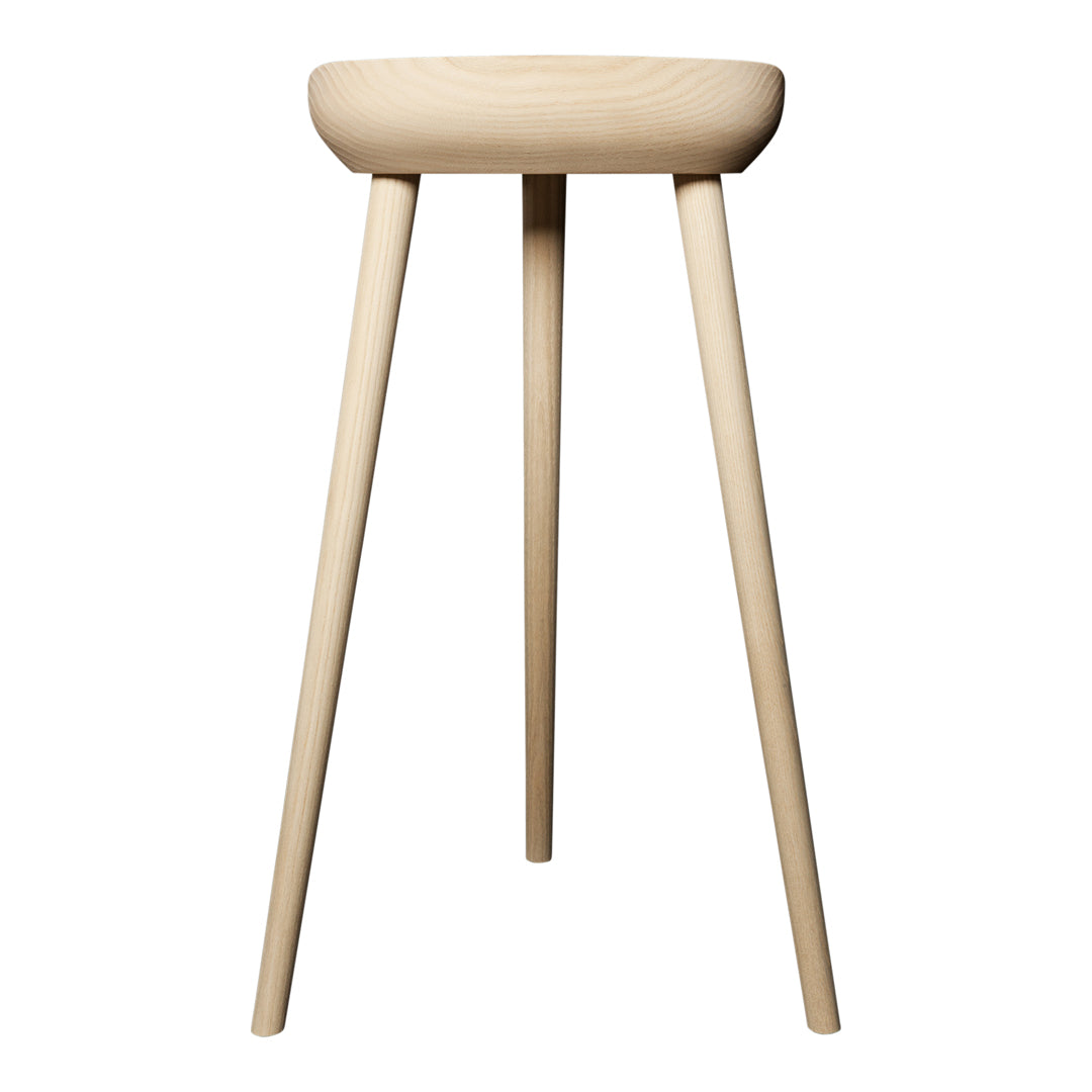 Natural wood stool with a smooth, light beige finish and simple, sleek design. Perfect for modern decor.