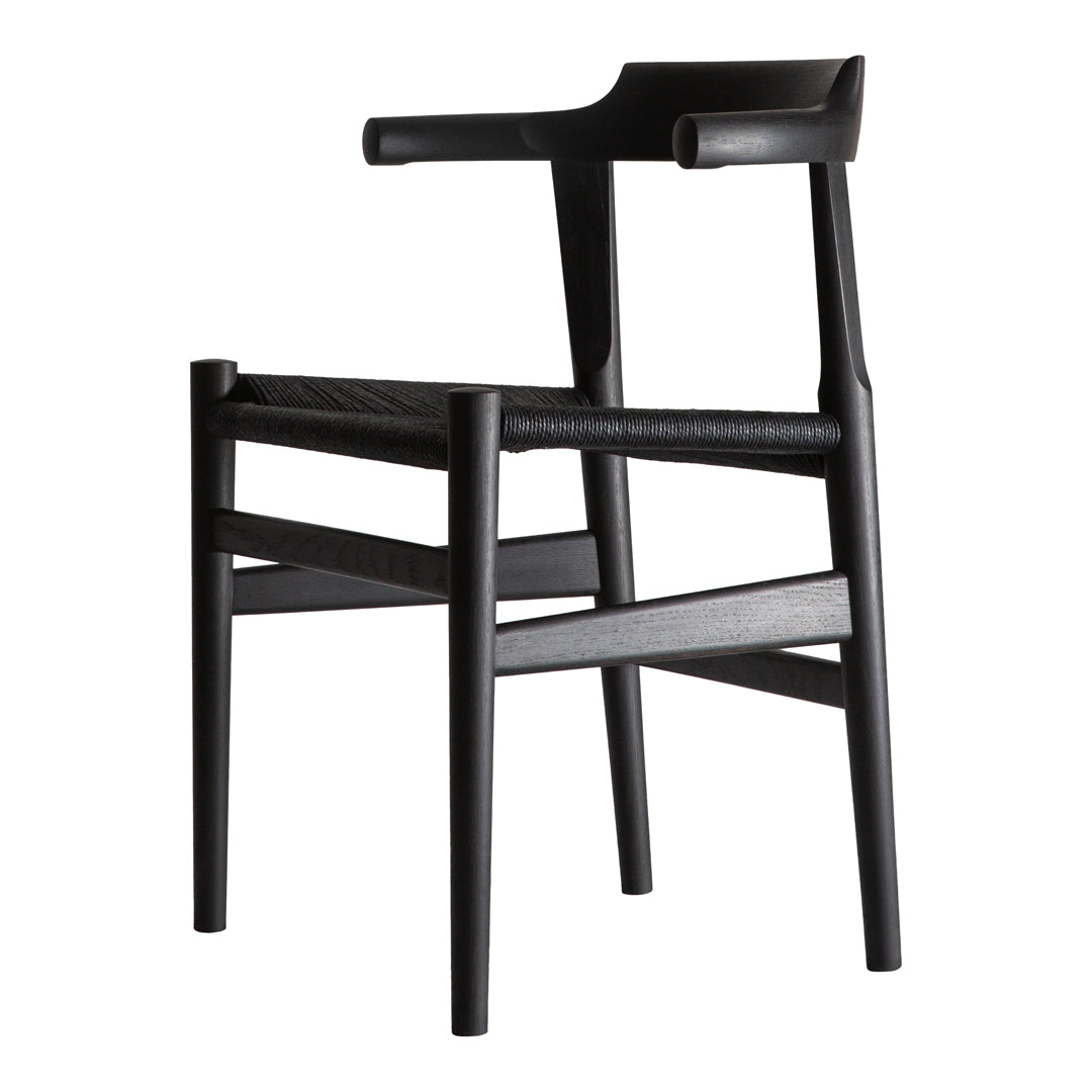 Sleek black wooden chair with minimalist design and textured seat pattern, perfect for modern home decor.