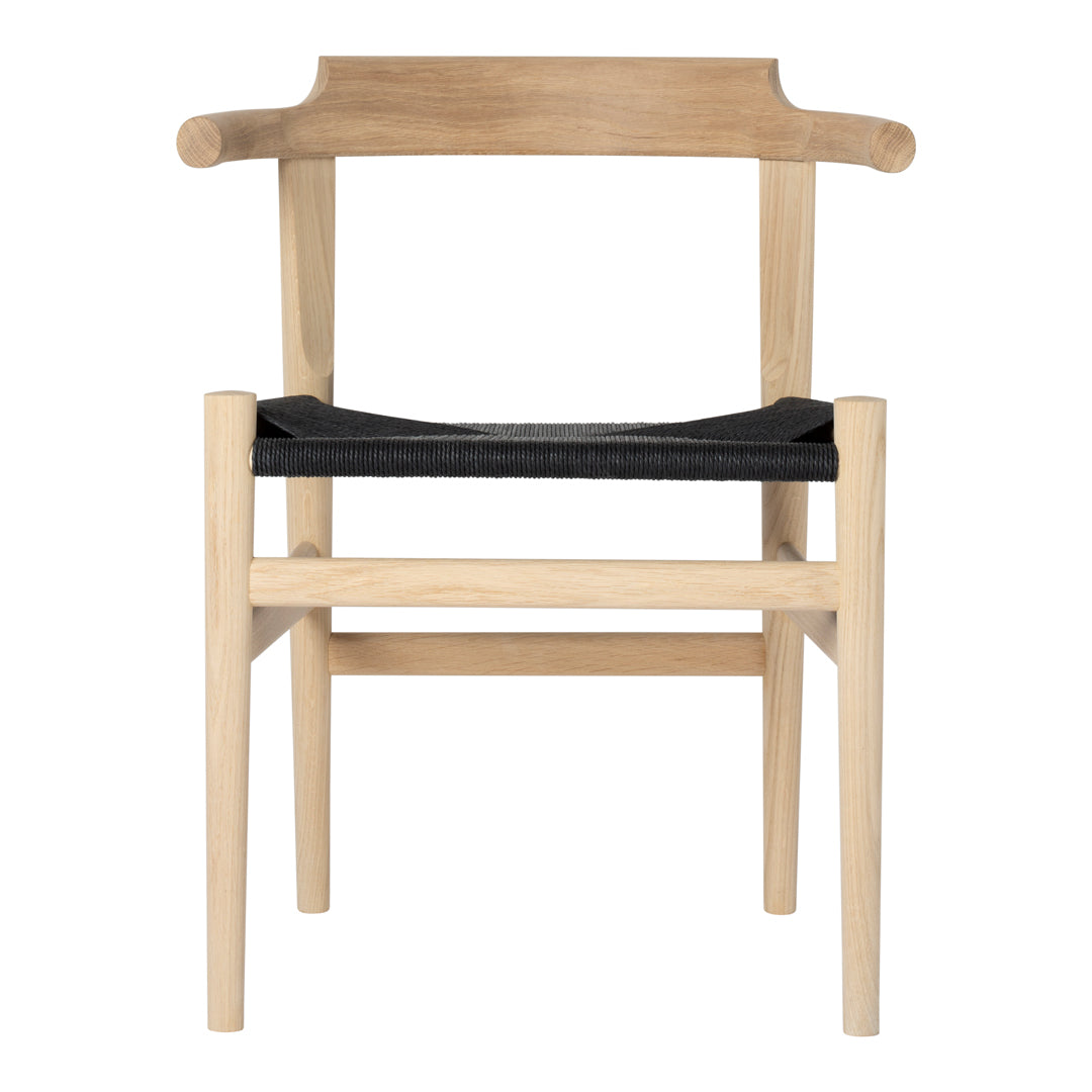 Natural wood chair with a light finish and a dark fabric seat, featuring a minimalist design and clean lines.