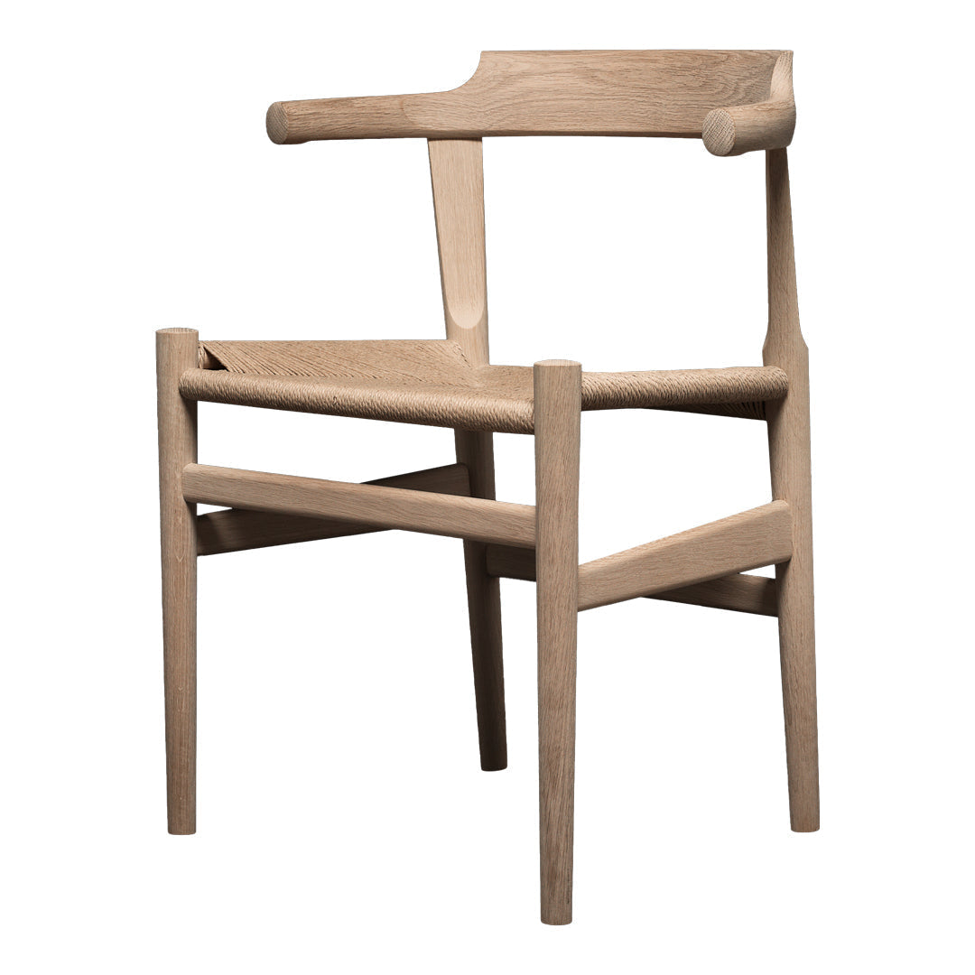 Light natural wood armchair with a minimalist design and smooth, clean lines. Perfect for modern decor.