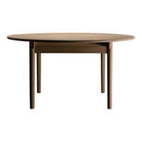 Round wooden table with a smooth, natural finish and minimalist design in warm brown tones. Perfect for modern spaces.