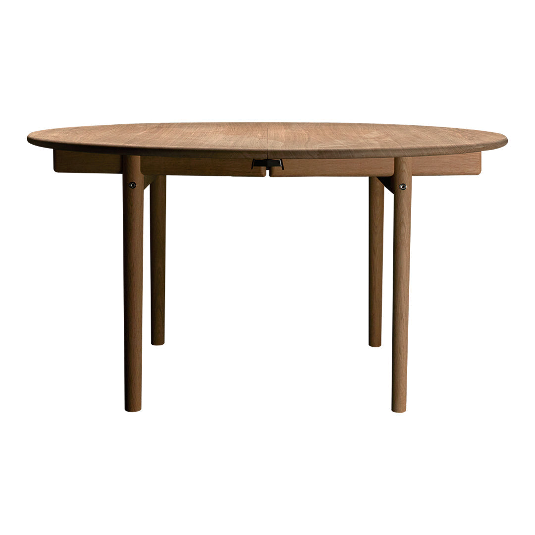 Round wooden table with a natural finish and simple design, featuring a light brown color and smooth surface.