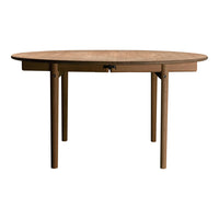 Round wooden table with a natural finish and simple design, featuring a light brown color and smooth surface.