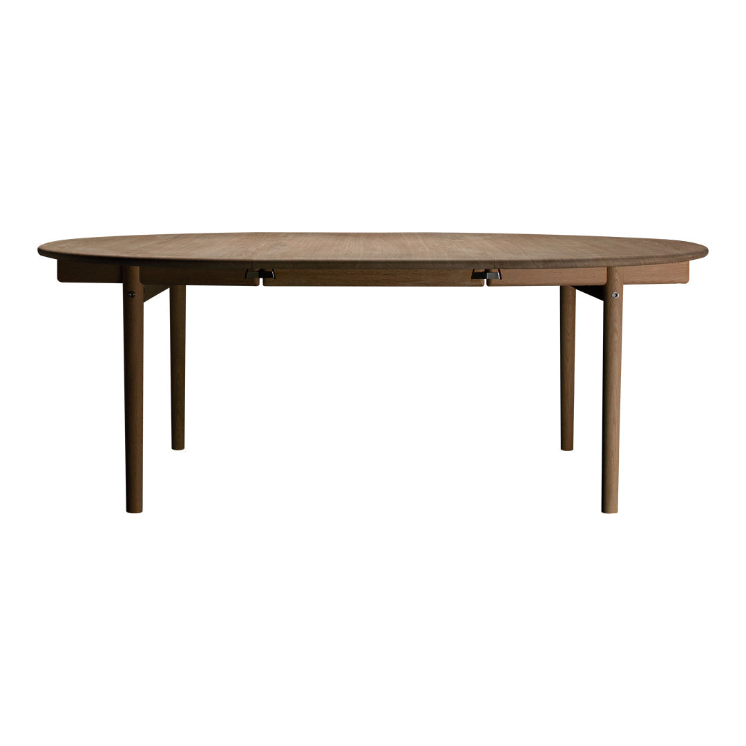 Oval wooden table with a natural wood finish and simple, clean design. Ideal for modern home decor.
