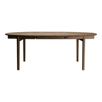 Oval wooden table with a natural wood finish and simple, clean design. Ideal for modern home decor.