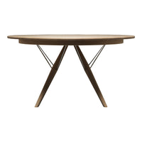 Modern round wooden dining table with a natural brown finish and sleek black metal legs, showcasing a minimalist design.