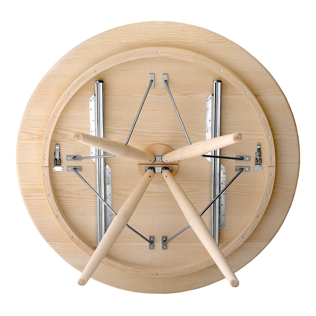 Round wooden table base with natural wood finish and metallic silver accents. Clean lines and minimalist design.