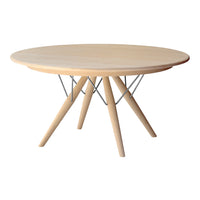 Round wooden table with a natural light finish and sleek metallic wire base, featuring a minimalist design.