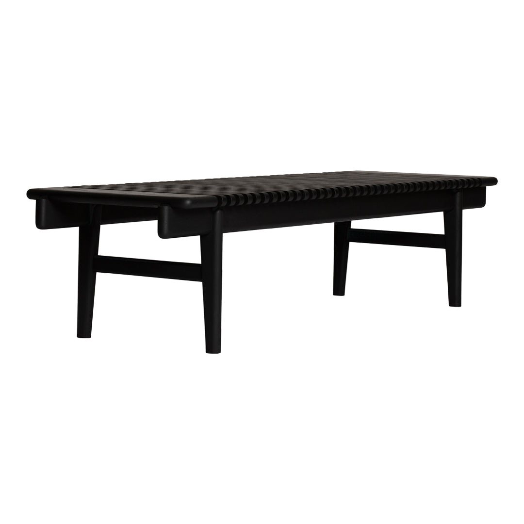 Black bench with a horizontal slatted pattern and ribbed detailing, featuring sleek, minimalist design.