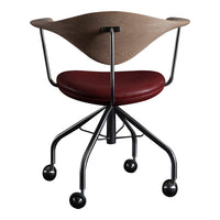Modern chair featuring a wood back in light brown and a deep maroon seat, on a sleek black wheeled base.