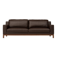 Brown leather sofa with sleek lines and wooden legs, featuring a smooth, minimalist design for modern interiors.