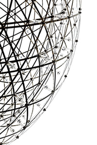 Elegant black and silver geometric sphere with intricate lines and sparkling accents. Perfect for modern decor.