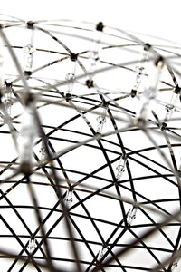 Intricate black metal framework with clear crystal accents, showcasing a modern geometric pattern.