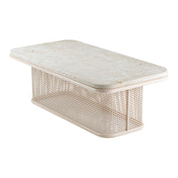 Light beige coffee table with a textured, marble-like top and a geometric, perforated metal base. Modern and stylish design.