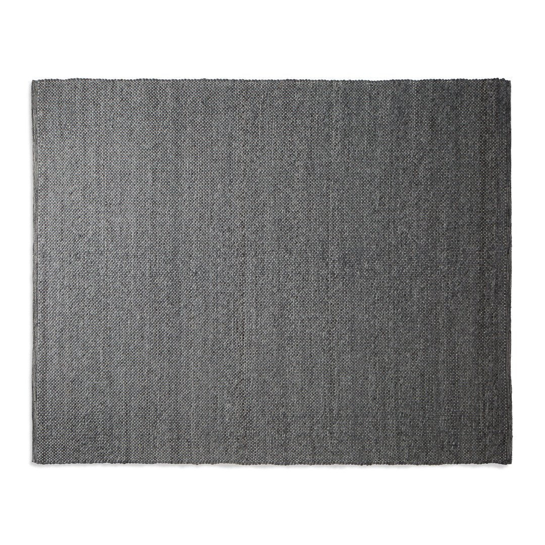 Gray textured rug showcasing subtle stripes for a modern, sleek look. Ideal for stylish home decor.