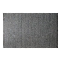 Gray textured rug with subtle variations, featuring a minimalist design for modern decor.