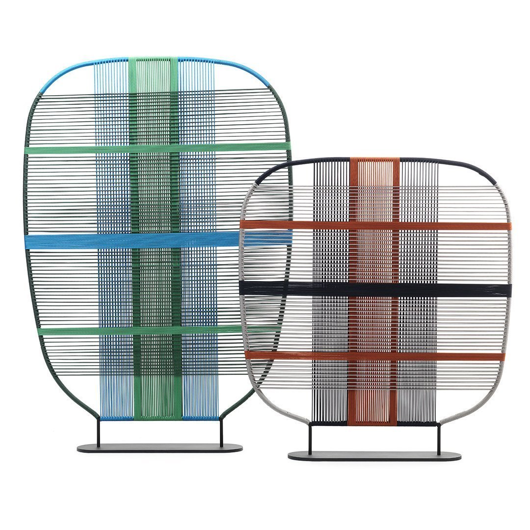 Twin decorative panels featuring green, blue, orange, and black lines in a grid pattern on a sleek frame.