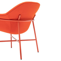 Bright orange chair with a modern design and sleek metal legs. Ideal for adding a pop of color to any space.
