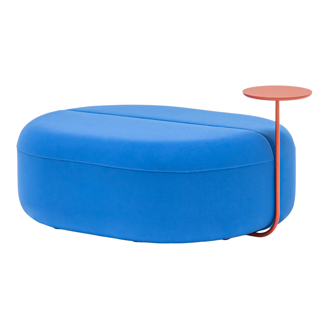 Blue upholstered ottoman with a smooth, rounded shape and a contrasting orange side table. Modern and vibrant design.