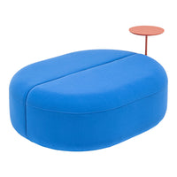 Bright blue upholstered ottoman with smooth, rounded edges and a contrasting red side table. Perfect for modern decor.
