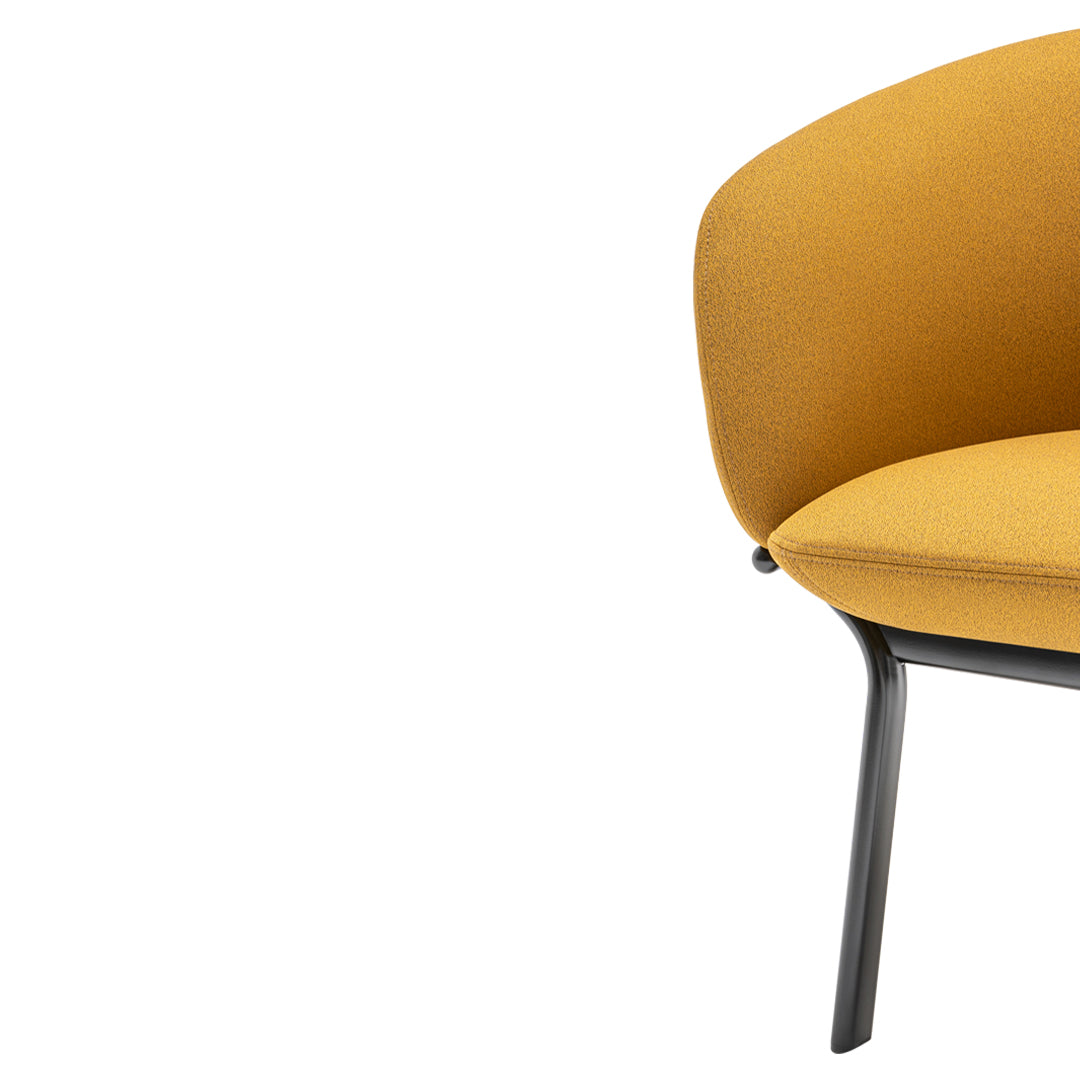 Stylish yellow upholstered chair with a sleek black metal frame, showcasing a smooth, minimalist design.
