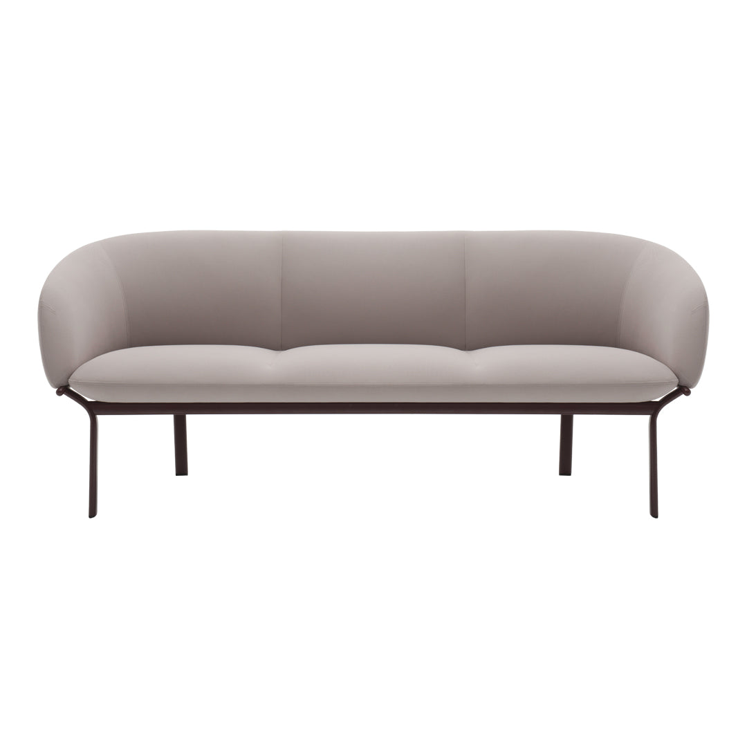 Elegant light beige sofa with a smooth, minimalist design and dark metal legs. Perfect for modern decor.