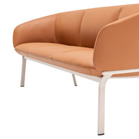 Stylish orange leather sofa with smooth curves and sleek white legs, perfect for modern living spaces.