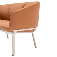 Modern orange couch with smooth upholstery and sleek white metal legs, featuring a minimalist design for stylish decor.